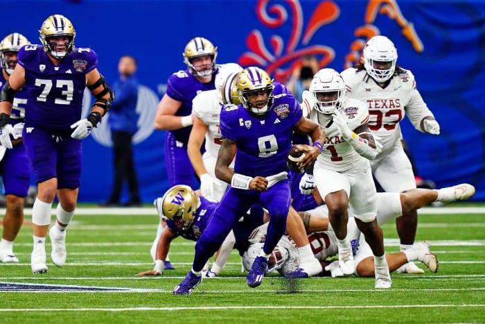 Jan 1, 2024; New Orleans, LA, USA; Washington Huskies quarterback Michael Penix Jr. (9) runs with the ball during the third quarter against the Texas Longhorns in the 2024 Sugar Bowl college football playoff semifinal game at Caesars Superdome.